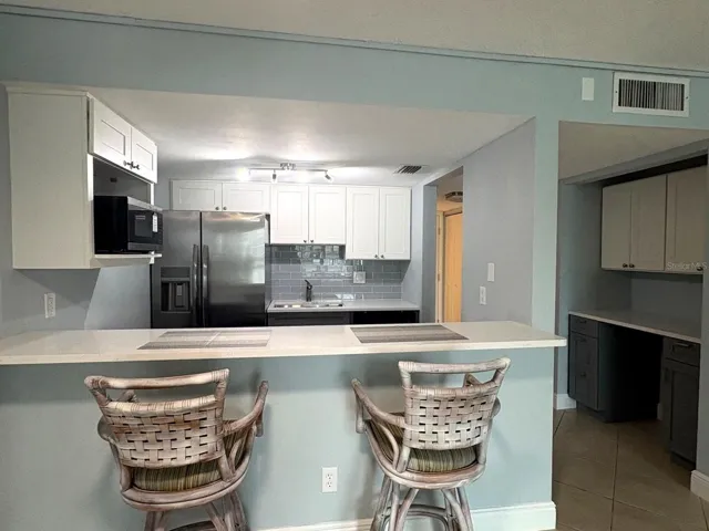 Fully remodeled kitchen 2025 new quartz countertops with beautiful tile backsplash