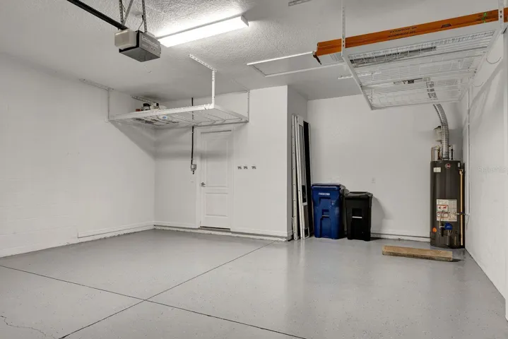 Garage - 2 Hanging storage racks convey