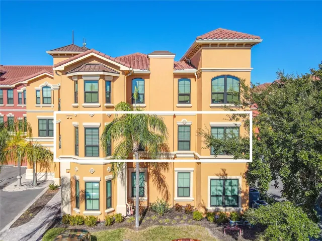 Sun-drenched Mediterranean elegance rises above palm-lined grounds, welcoming you to refined waterfront living at The Grand Bellagio 2 bedroom/2bath/den condo.