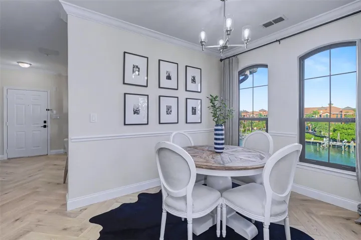 Dining room with triple windows to capture the water views