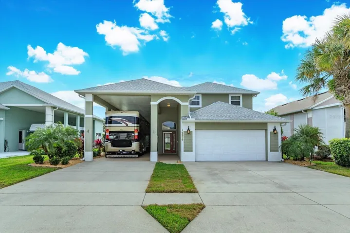 RV Port Home has 49' port with dedicated 50 and 30 amp connection for your RV along with water and sewer.  THIS IS THE FAVORITE MODEL in all of Citrus Highlands Phase 1 but with a rear garden WATER VIEW.