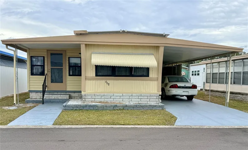 Florida Room / Enclosed Porch * Front Facing Kitchen