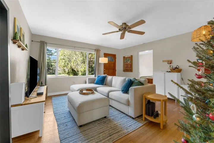 Living Room with large window overlooking lake
