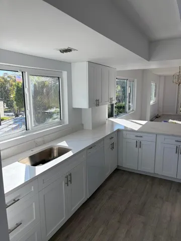 Light and bright. New windows installed in January with views from both sides of kitchen. Open plan
