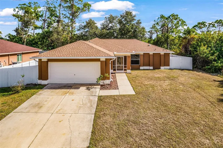 Front of home and totally fenced yard!
