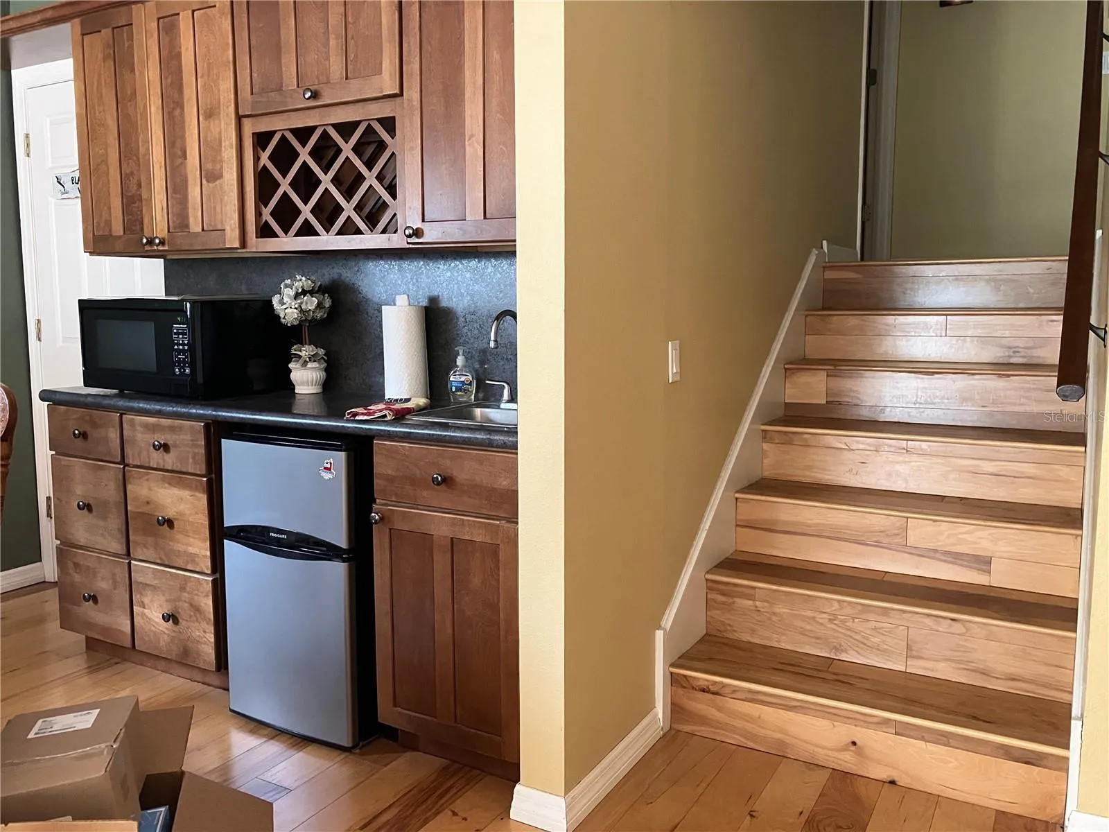 Mini bar area in the  BONUS ROOM with beautiful flooring throughout
