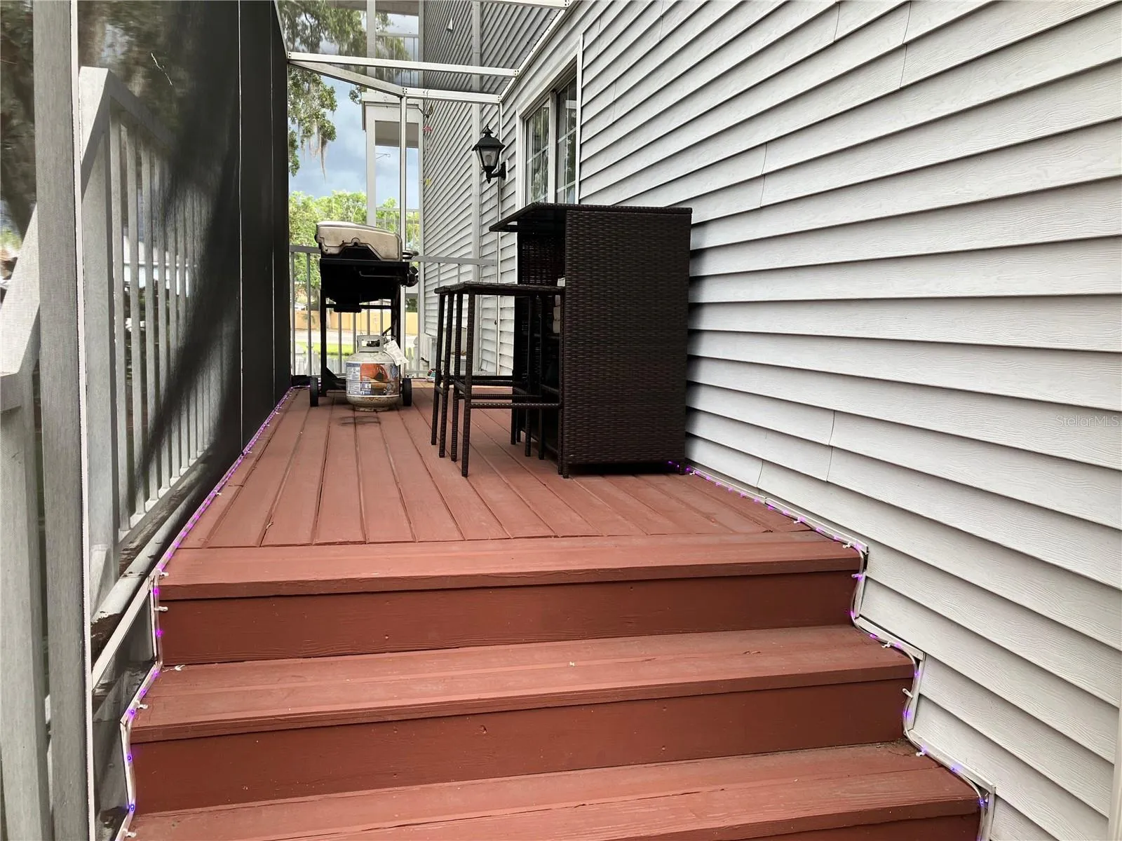 Extra side balcony space for outdoor grilling, next to the kitchen