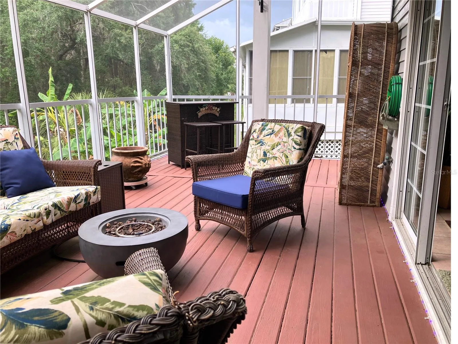 Extra outdoor living space on the enclosed balcony