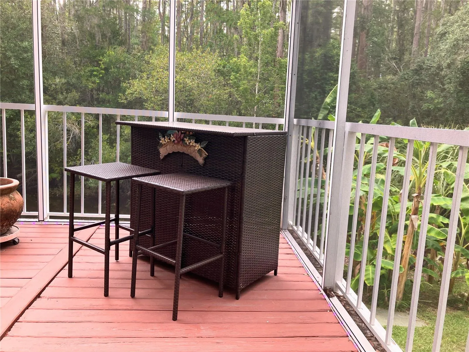 Spacious balcony has such an incredible view of the wildlife, and cypress trees.