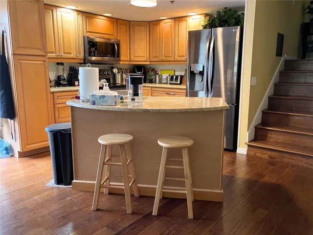 Island has sink enabling you to stay connected with guests while you prep food and wash dishes.