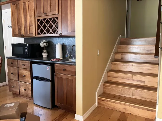 Mini bar area in the  BONUS ROOM with beautiful flooring throughout