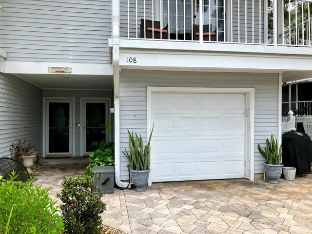 One car garage and large parking space