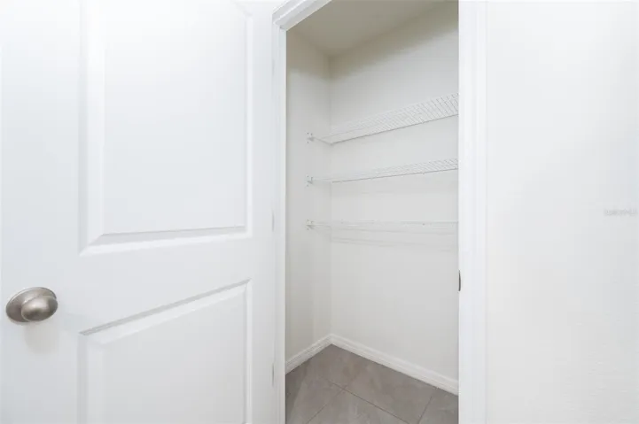 Owner's Suite En Suite Bathroom Linen Closet