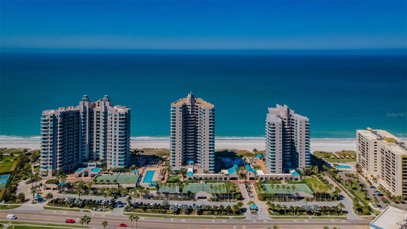 LEASE OPTION: Presenting the Ultimar Luxury Sky Residence # 1201 situated on Pristine Sand Key.  Offerinf the Finest of Amenities.  The Ultimar One Resort property is a gated community providing 24/7 on-site security, gulf-front heated pool, spa and fitness center, tennis, putting green and more.