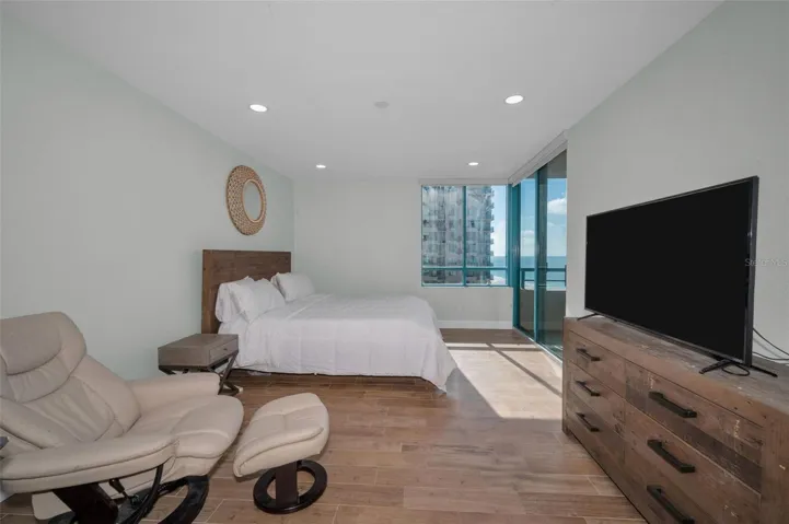 Master Suite Retreat Scenic Surround to Aquamarine Panorama with Terrace Access. Features a Bath including, Dual Sink Vanity, Walk In Closet Dress Area & Spacious Walk In Shower & Free Standing Soaking Tub.