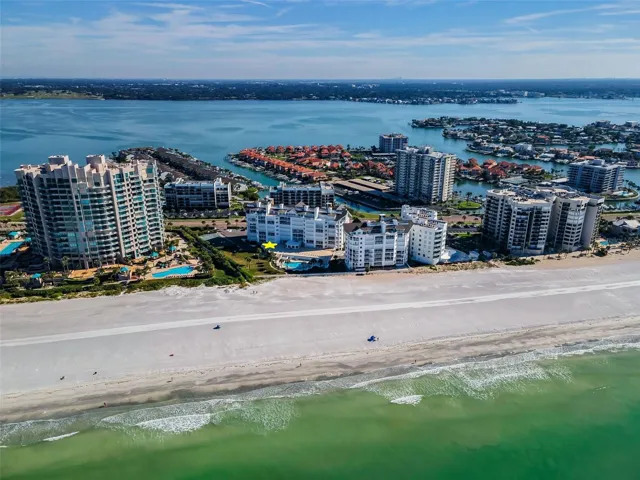 ... Boat Parades- Sailing Regattas - Sand Key Florida - The Beach on One Side and the Intracoastal Waterway on The Other Side. The Cabana Club Enjoys the Beach Side.