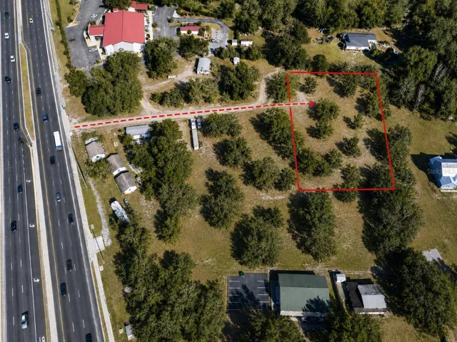 AI-generated conceptual rendering for illustrative purposes only. Tree density and other site features may not reflect actual conditions. The highlighted easement is shown as a visual aid only and is not intended to represent a surveyed boundary. Buyers should verify all property information independently.