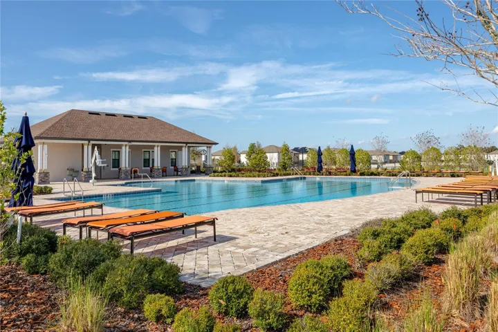Lap pool with expansive sun deck, perfect for enjoying the FL sun!