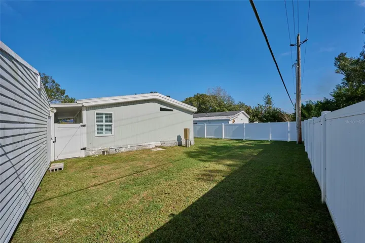 Large, fully fenced backyard