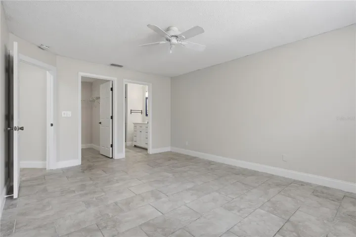 Owners suite with tile flooring
