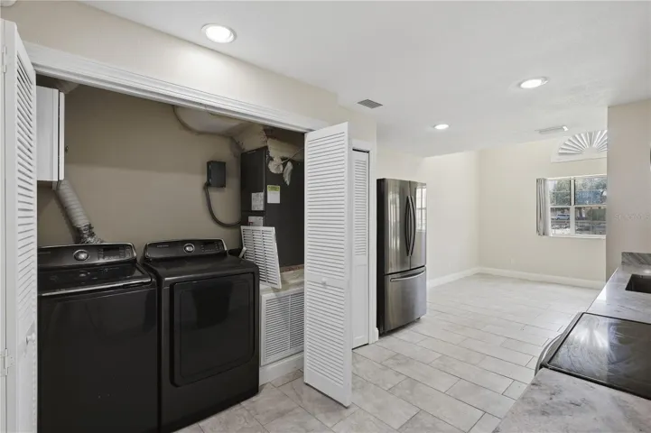 Washer and dryer conveniently located in the kitchen