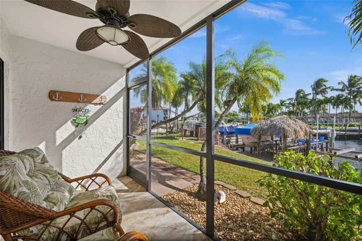 Relax in the screen porch and watch the boats go by