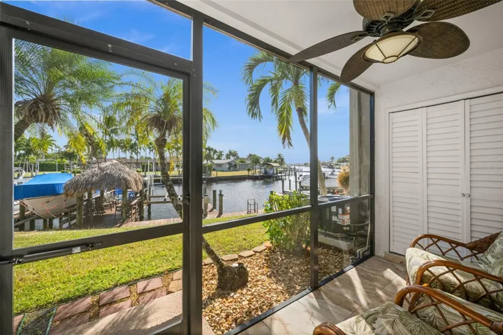 Screen Porch with a view down the Gulf Access Canal