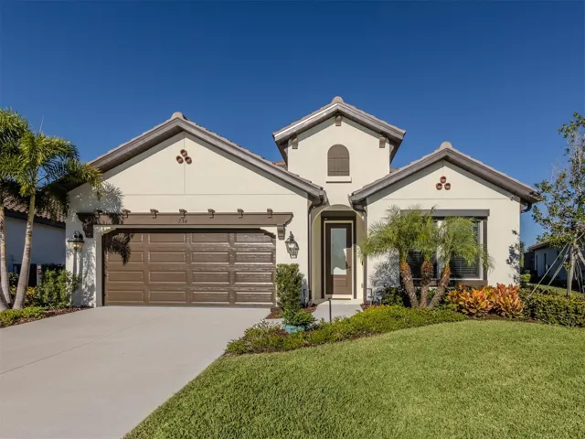 Inviting entry with Miami Dade rated front multi locking door.