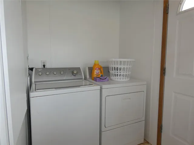 Inside laundry off kitchen, washer/dryer