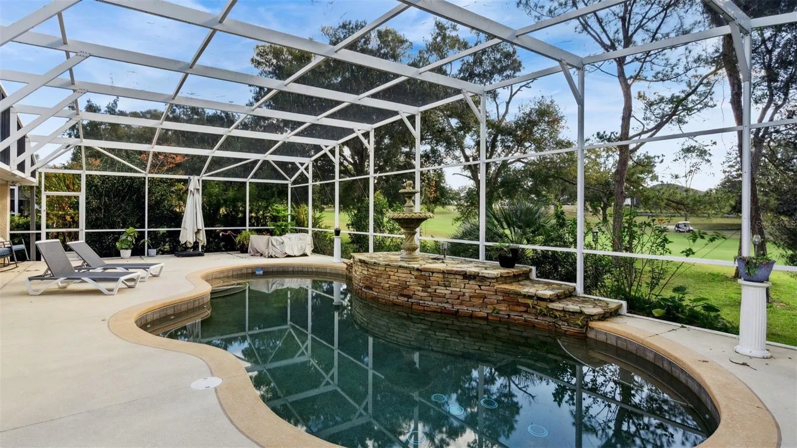Pool overlooking the golf course.