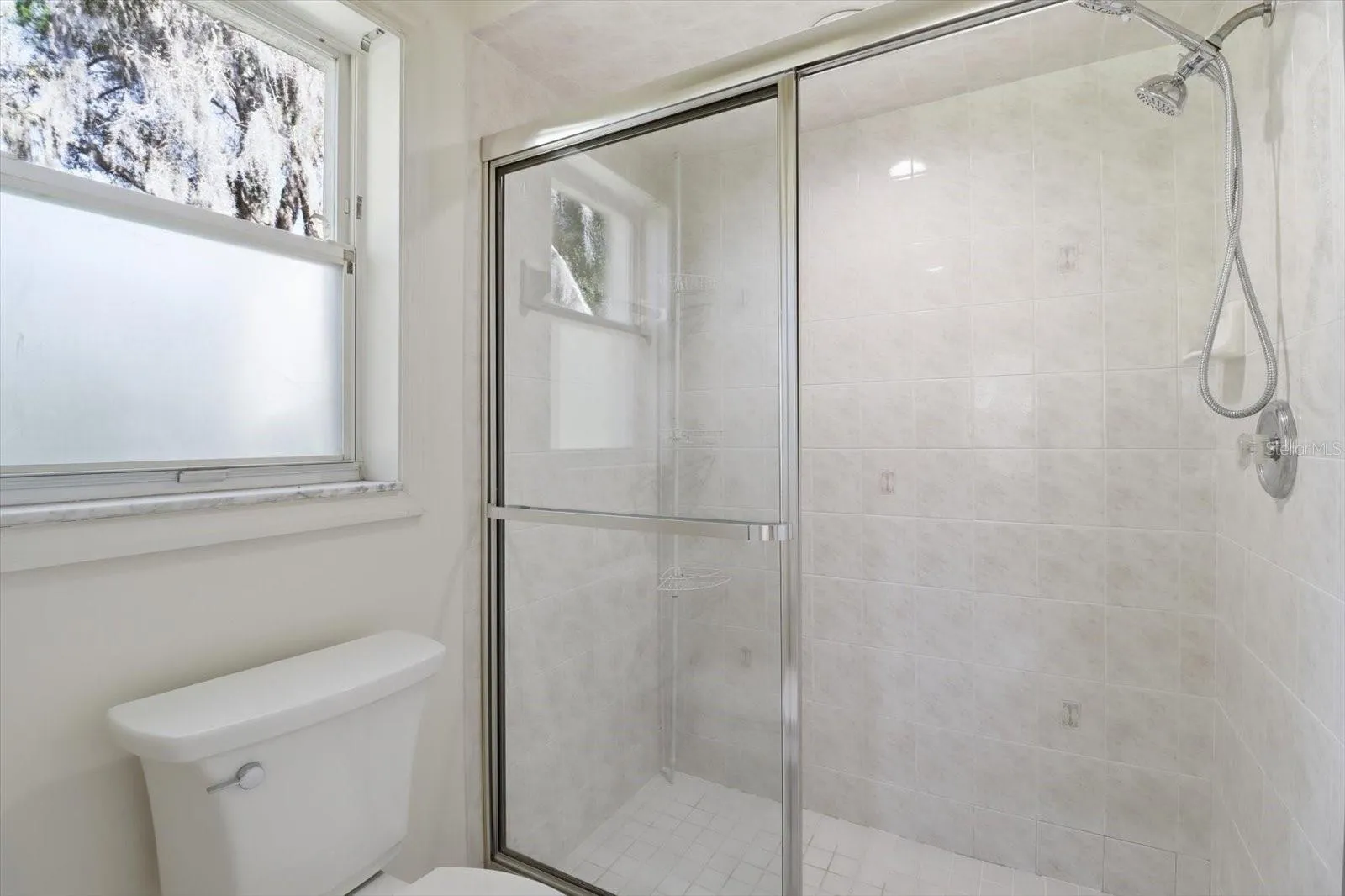 Tiled Shower w/ Handheld Shower Head