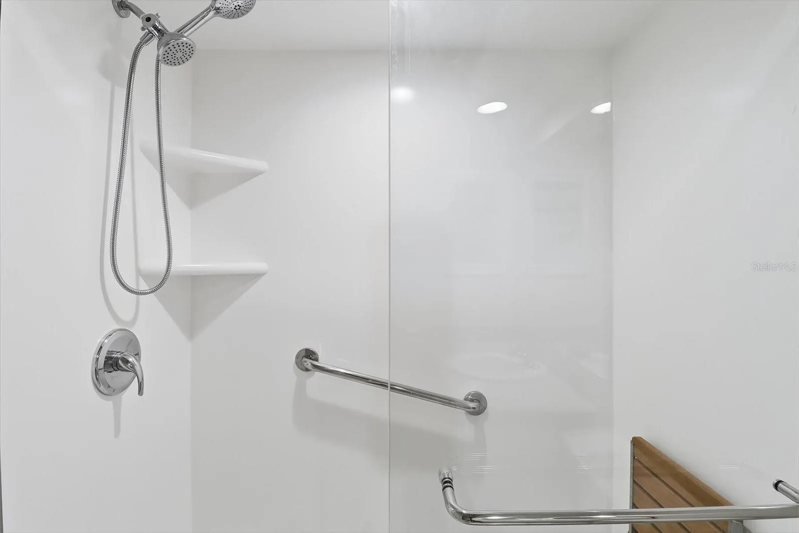 Guest Bathroom... Shower w/ Grab Bar, Corner Shelves & Fold Up Seat