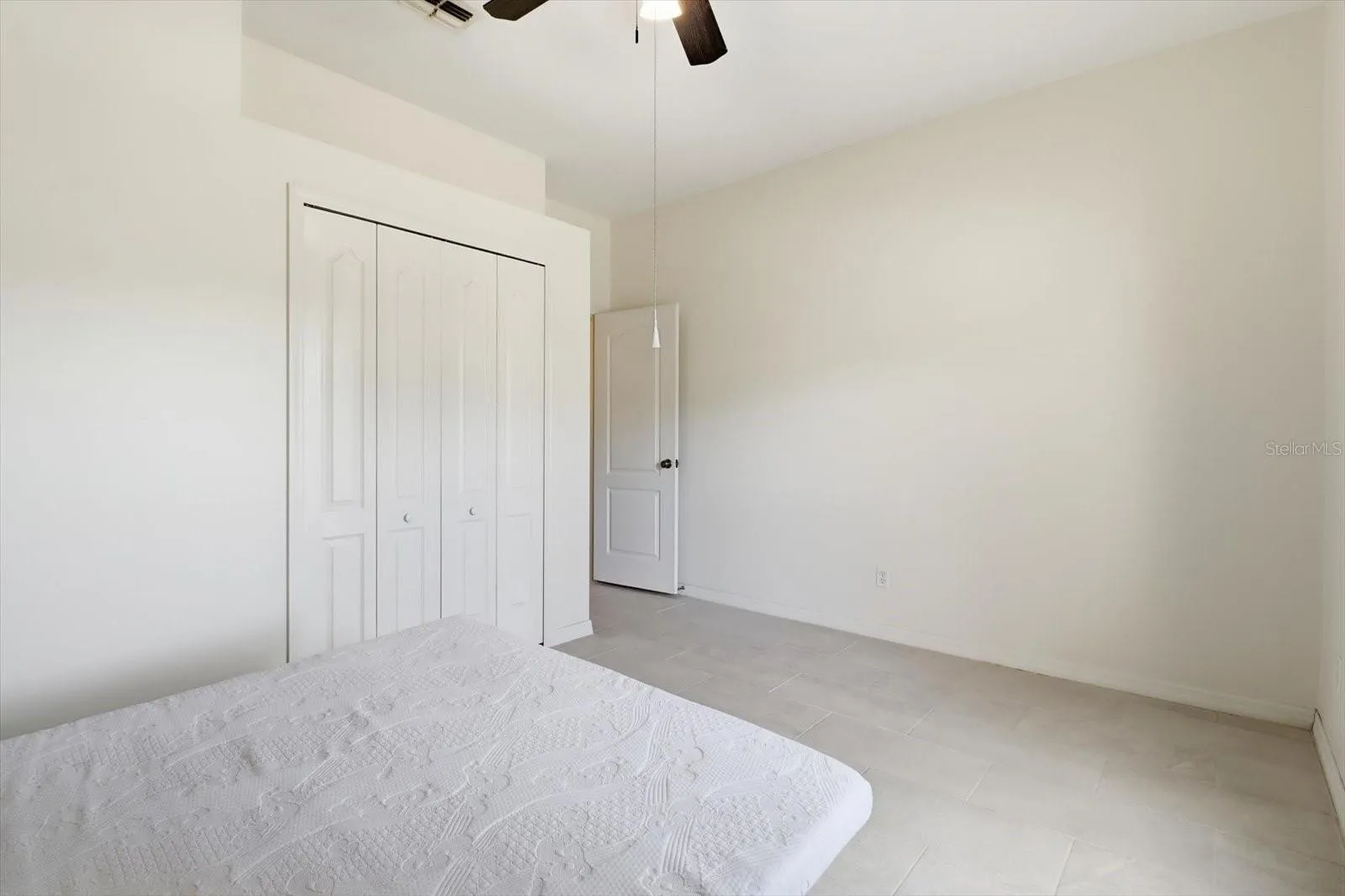 Guest Bedroom w/ Double BiFold Closet