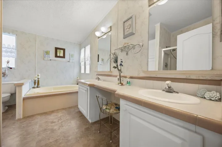 Primary EnSuite 12'10" x 12 Ceramic Tile, Double Vanity with Make-Up Area