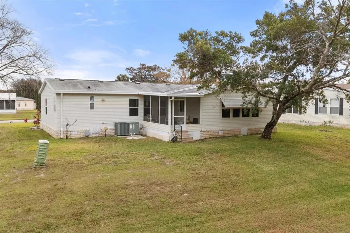 Back view **Pet Approved Home, Your pet will love this backyard!