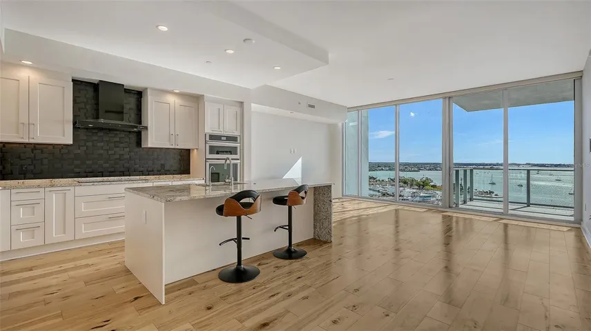 open floor plan with floor-to-ceilings glass
