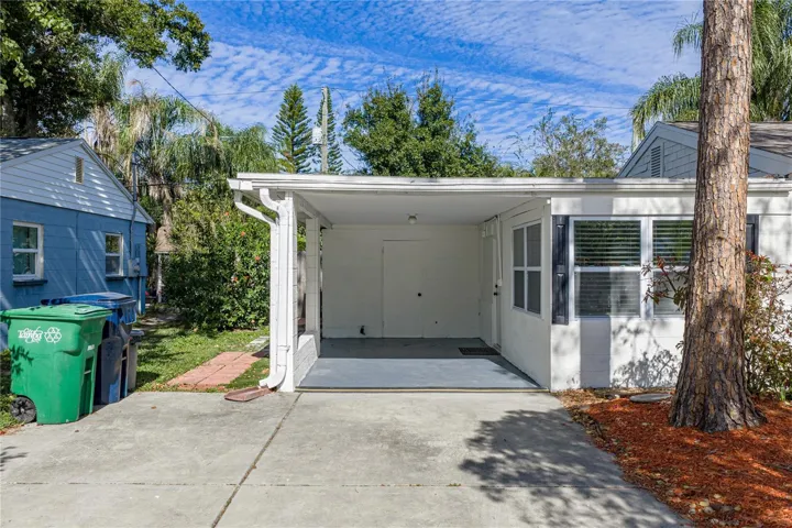 1 Car Carport with oversized 2 Car Driveway.