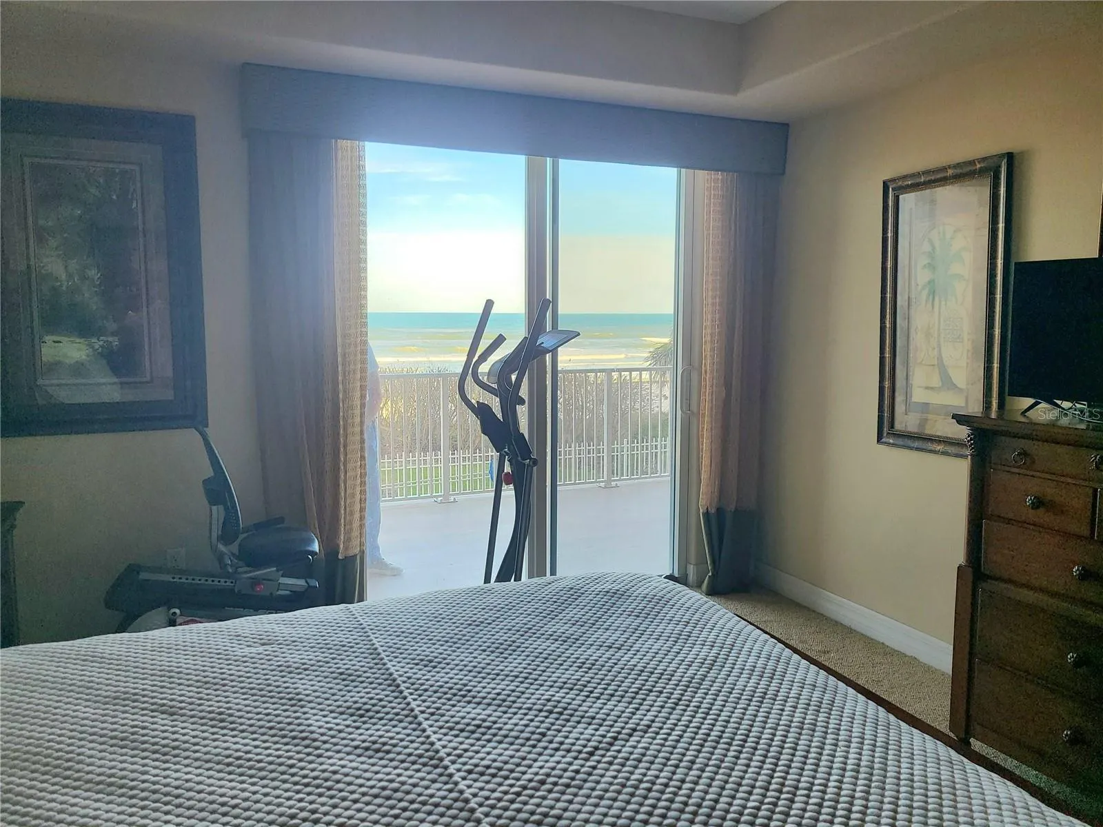 PRIMARY BEDROOM WITH OCEANFRONT VIEW