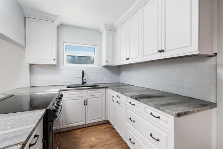 Kitchen renovated 2023 w/new appliances cabinets & granite counters.