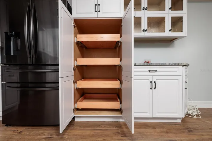 Kitchen Pantry w/Pull out shelves.