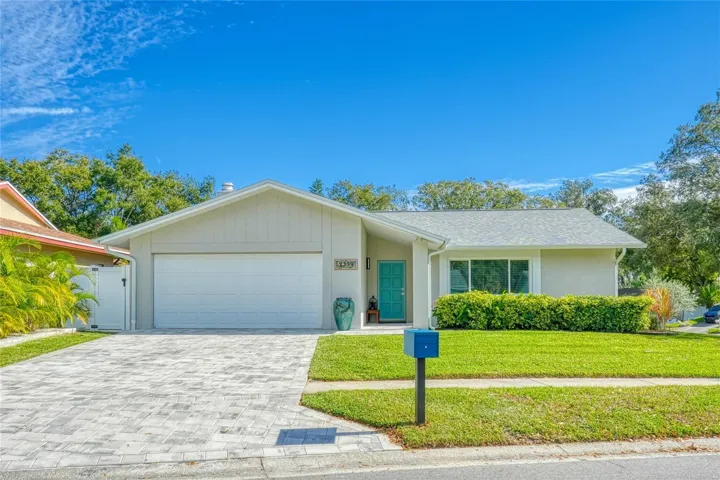 Welcome to 2339 Orangeside Road, located in Palm Harbor, Roof 2021, AC 2024, Hurricane Rated Windows & Doors 2021