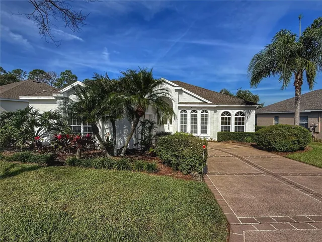 Front exterior with gutters, garage has painted floors and a sink, located on a cul de sac
