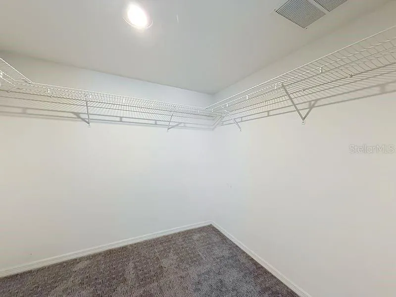 Primary walk-in closet