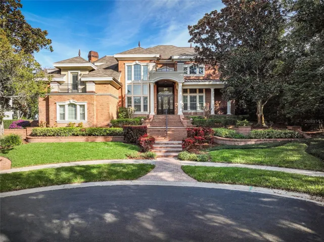 This stunning brick estate sits on .48 acres on the 12th Fairway of the Island Golf Course in Innisbrook Golf Resort. An exercise suite/in-law suite addition in 2017. New roof in 2017. Elevator to all levels. Generator. Oversized four car garage.