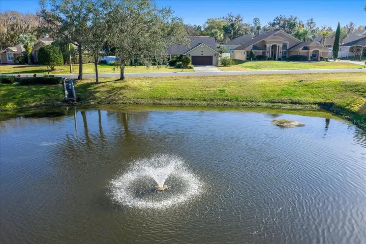 Front View of home across community pond