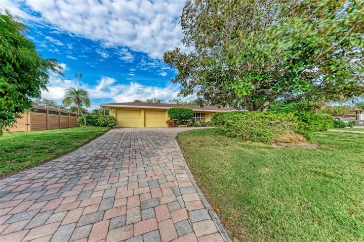 Paver drive and 2 car garage doors