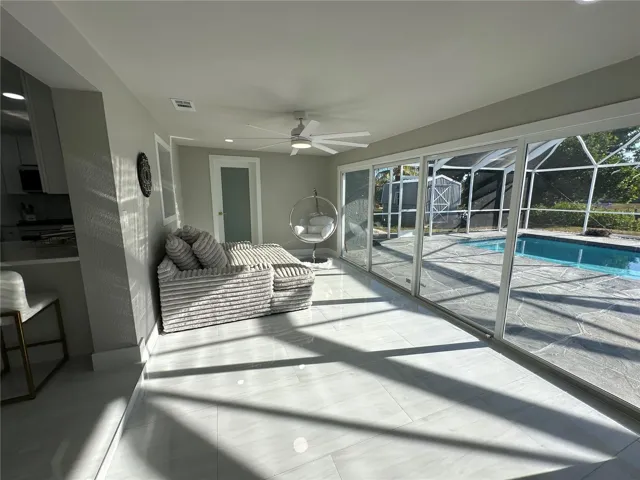 Family Room - view 1.  16' sliding glass door.