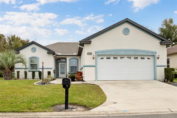 This beautiful 3 bedroom 2 bath stucco home has upgrades galore, a large screened in lanai with SALTWATER POOL, and a wooded view. It has everything you want and need in your Florida retreat.