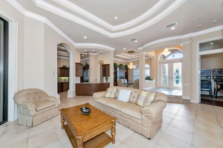 Side view from Family room to Foyer, Dining and wet bar