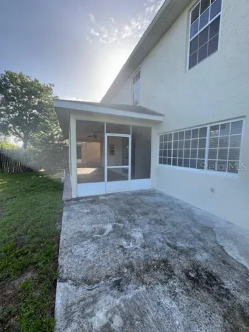 REAR PATIO & SCREENED PORCH